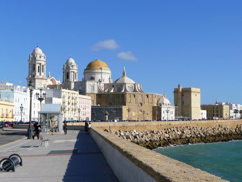 Seafront promenade and the golden-domed cathedral of Cádiz | Andaluciatours