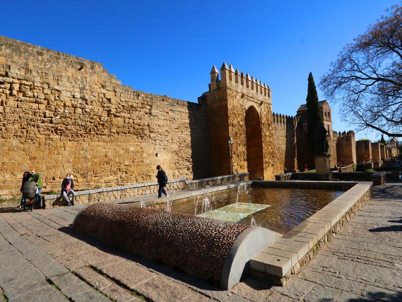 Stone wall, fountain, clear sky – Córdoba, Andalucía | Andaluciatours