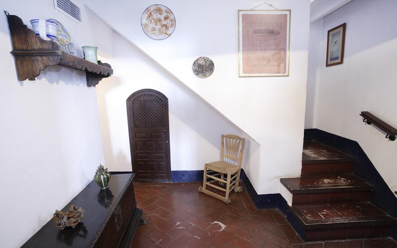 Staircase, chair, artwork – Manuel de Falla House Museum, Vega de Granada, Granada | AndaluciaTours