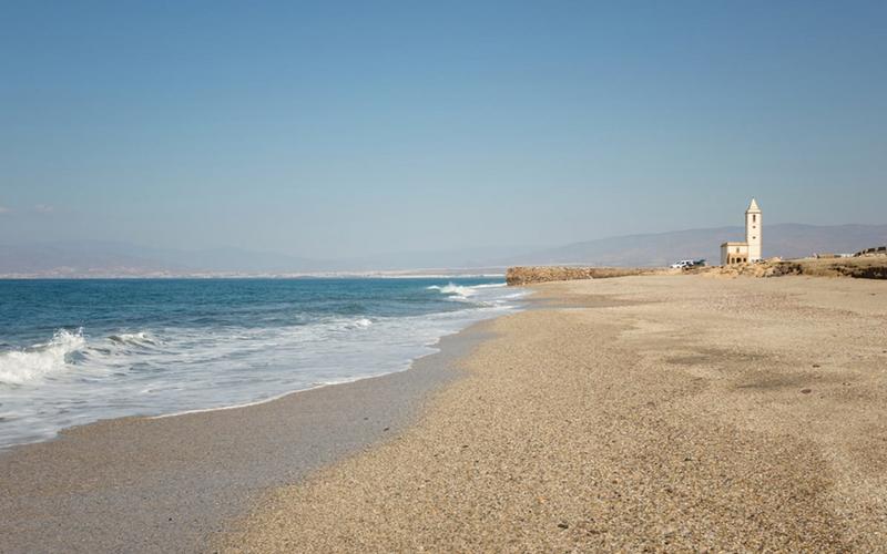 Beach, sea, church – Playa de las Salinicas, Levante Almeriense, Almería | Andaluciatours