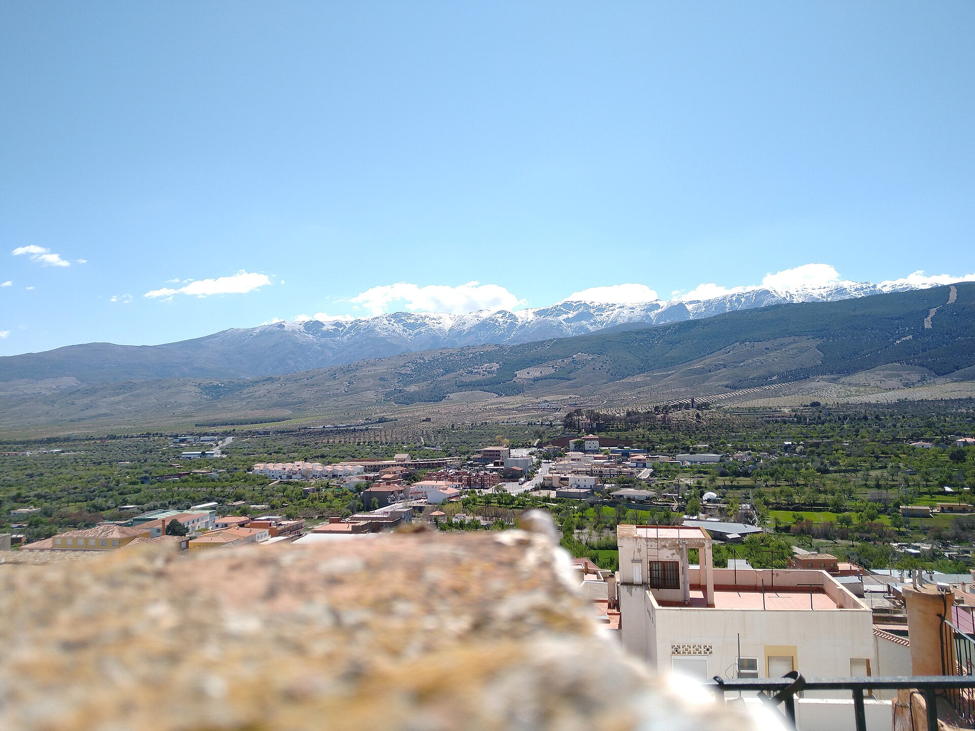 The north face of Sierra Nevada seen from Fiñana in the Río Nacimiento valley, Almería — explore it with Andaluciatours.