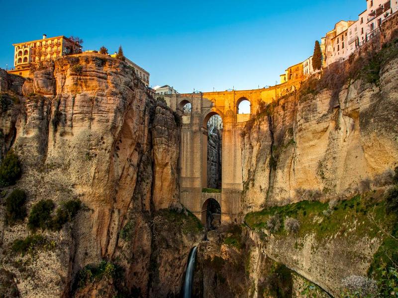Ronda's Puente Nuevo bridge spanning the dramatic El Tajo gorge in the Serranía de Ronda, Málaga — visit with Andaluciatours.